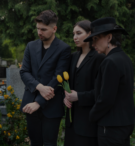 mourning-family-together-cemetery
